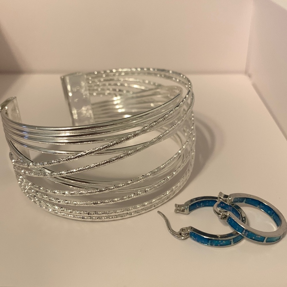 Never worn, bracelet and earrings